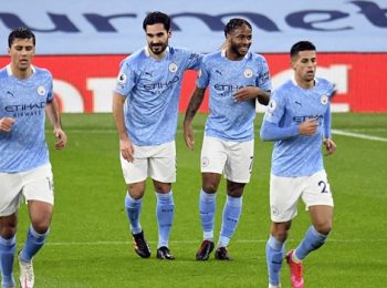 Manchester City wins record fourth consecutive title.